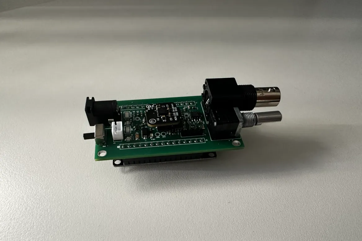 The fabricated shield soldered and seated on the ESP32 dev board underneath it